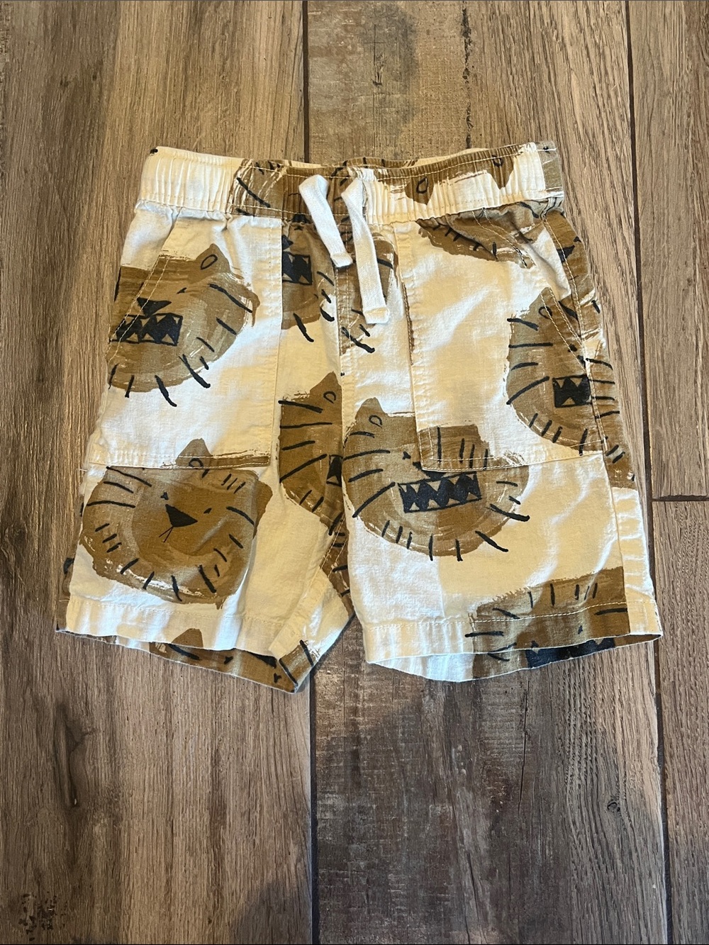 H&M Cream Shorts with Tan Lion Print